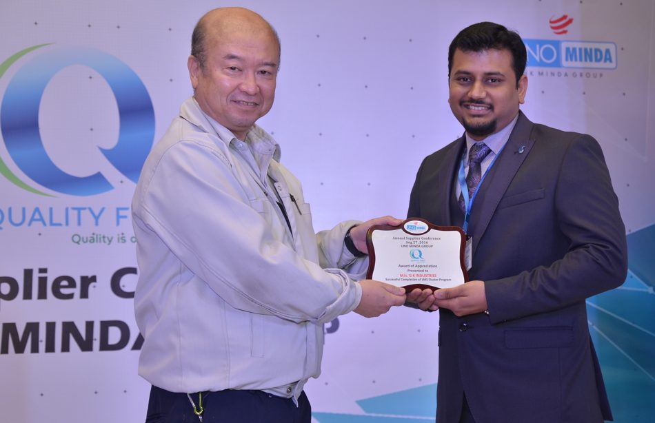 Receiving the Uno Minda LMS Cluster award
